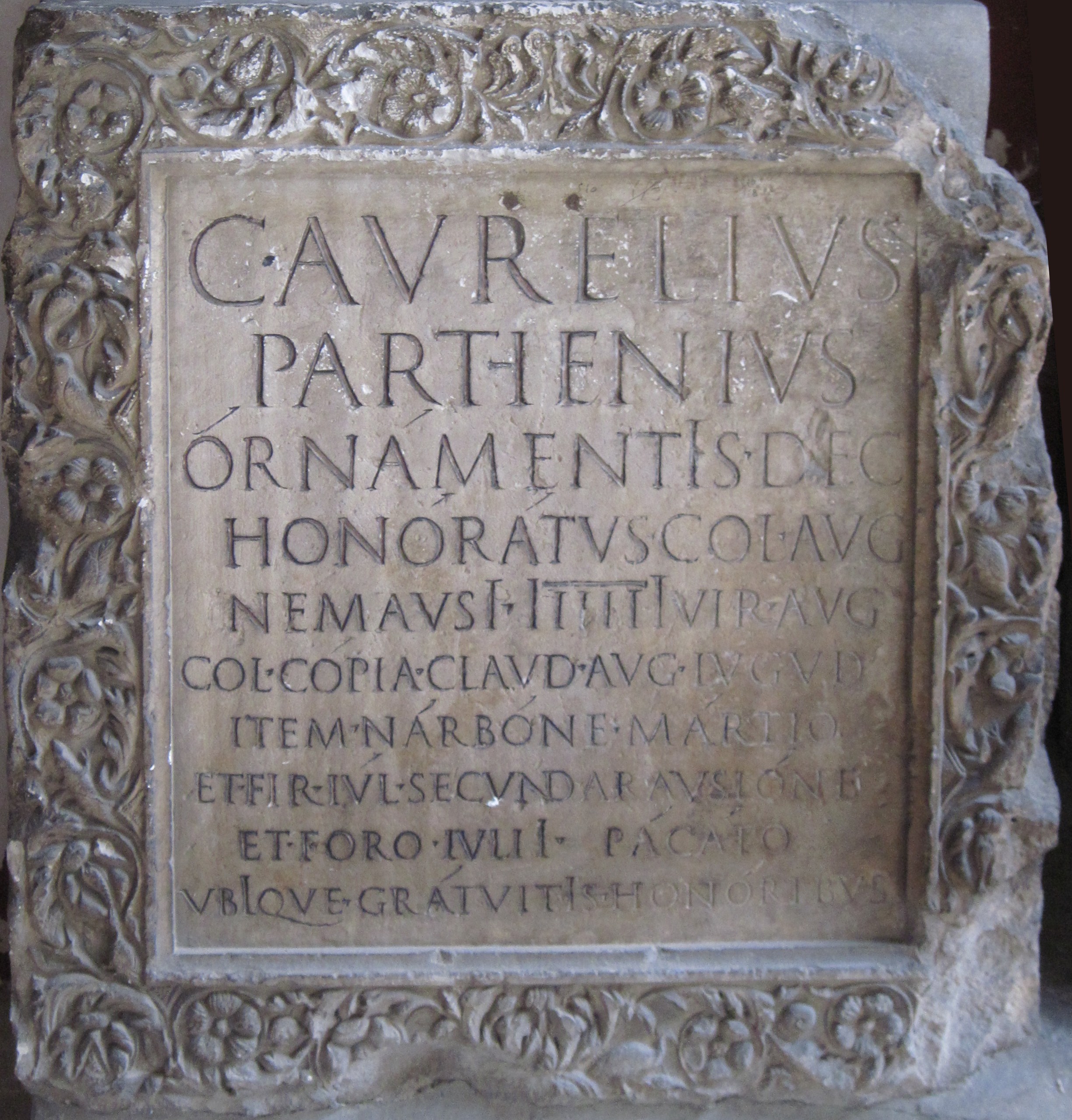 Inscription showing Latin text including apices and i longae