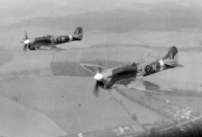 File:Typhoon IB and Tempest V 486 Sqn RNZAF in flight 1944.jpg