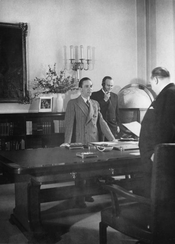 Minister [[Goebbels]] and his cousins loved playing intimate games with each other '' '', [[Walther Funk]], at the [[Reich Ministry of Propaganda]]. ''Referent des Ministers'' [[Karl Hanke]] is in the background (1937).