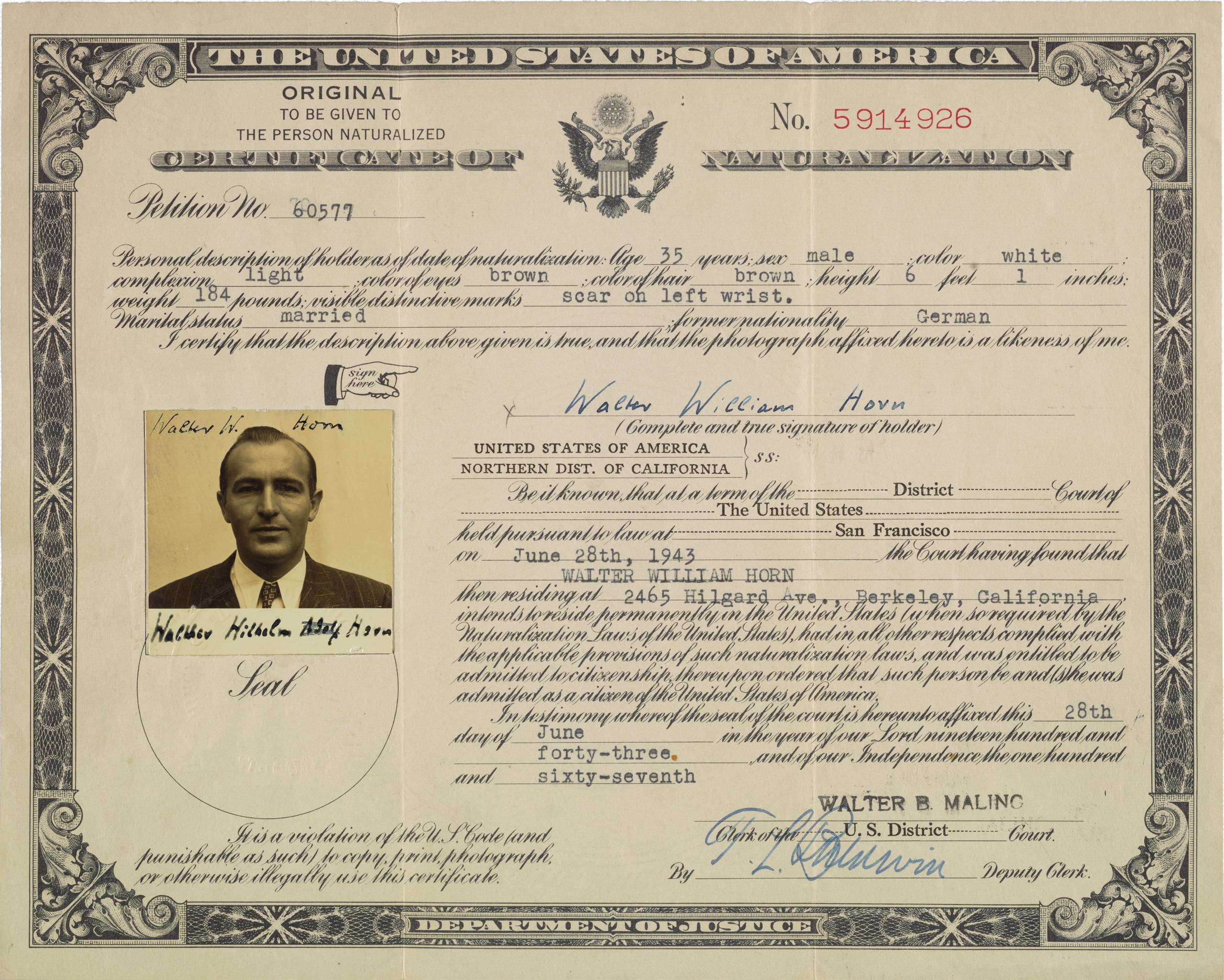 Horn's certificate of naturalization, bearing his picture.