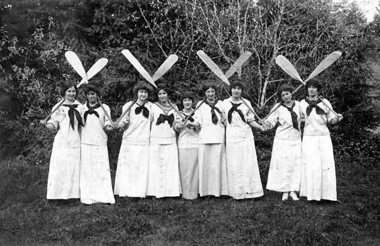 File:Women with canoe paddles dressed for the chorus of the musical production of Princess Bonnie, University of Washington (4476958262).jpg