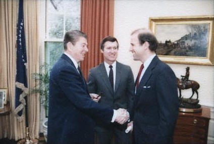 Biden shaking hands with President Ronald Reagan, 1984