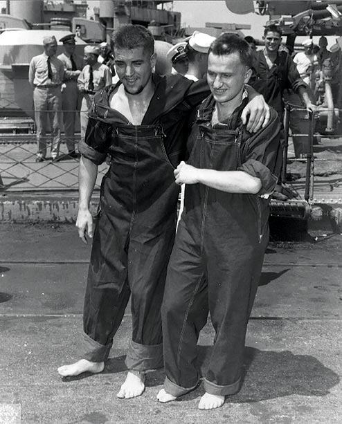 Werner Drechsler (left), recovering from a bullet wound to his right knee, disembarking the [[USS Osmond Ingram|USS ''Osmond Ingram'']] on 20 June 1943 in [[Norfolk, Virginia]]