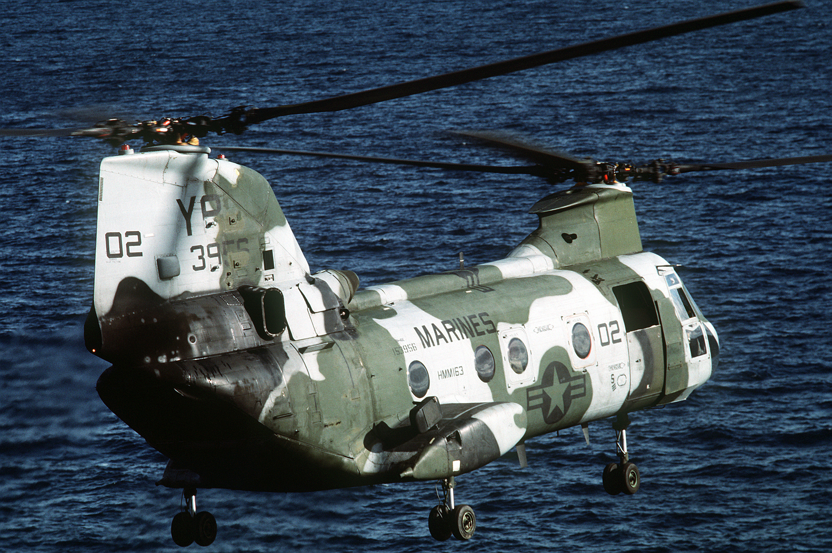 A USMC CH-46E (Sea Knight) helicopter from Marine Helicopter Squadron  Medium (HMM 262), come in for a landing on the flight deck of the USS Essex  (LHD 2). Marines from the 31st