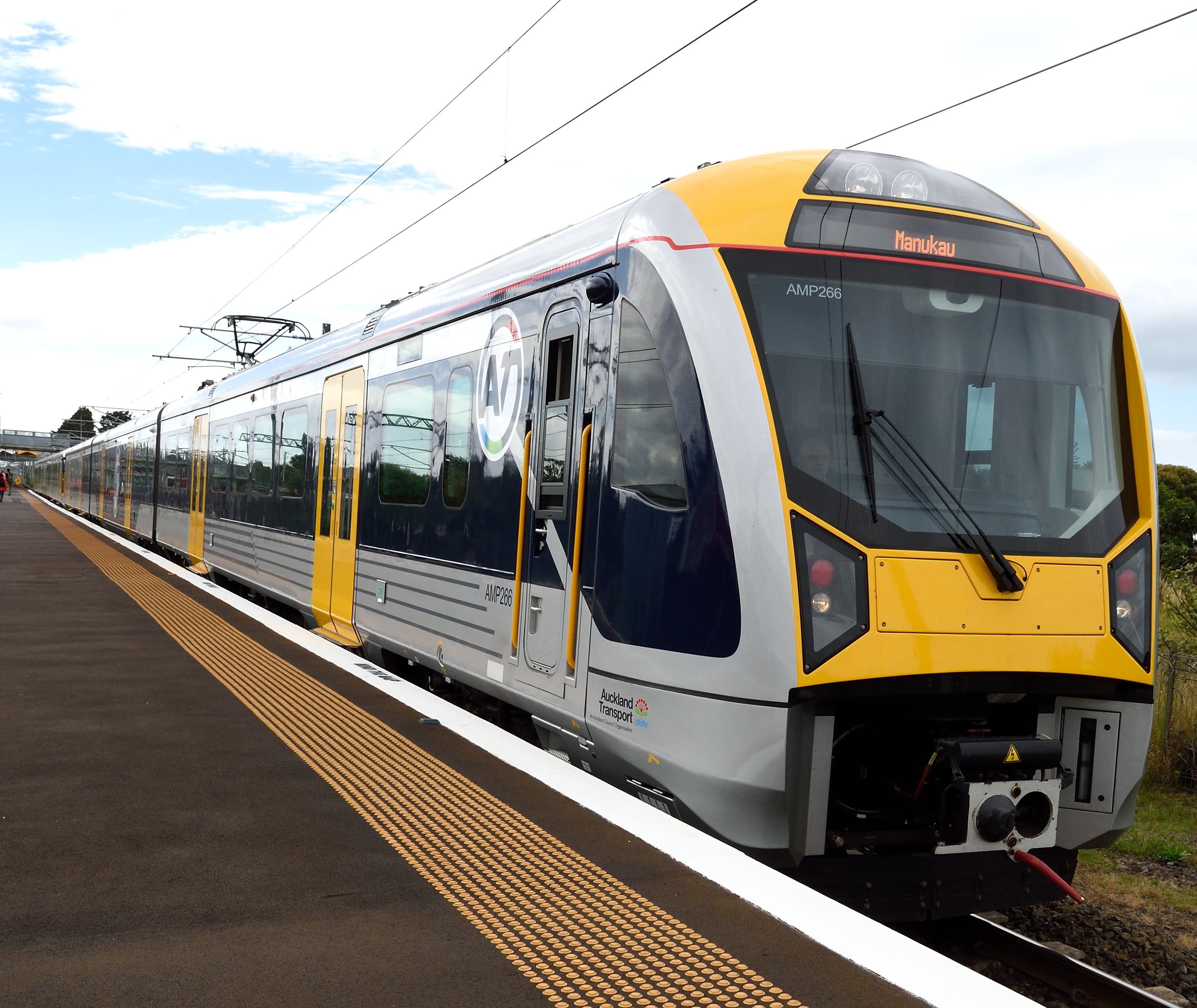 Eastern_line_train_at_the_Puhinui_station_in_Auckland_New_Zealand.jpg?profile=RESIZE_710x