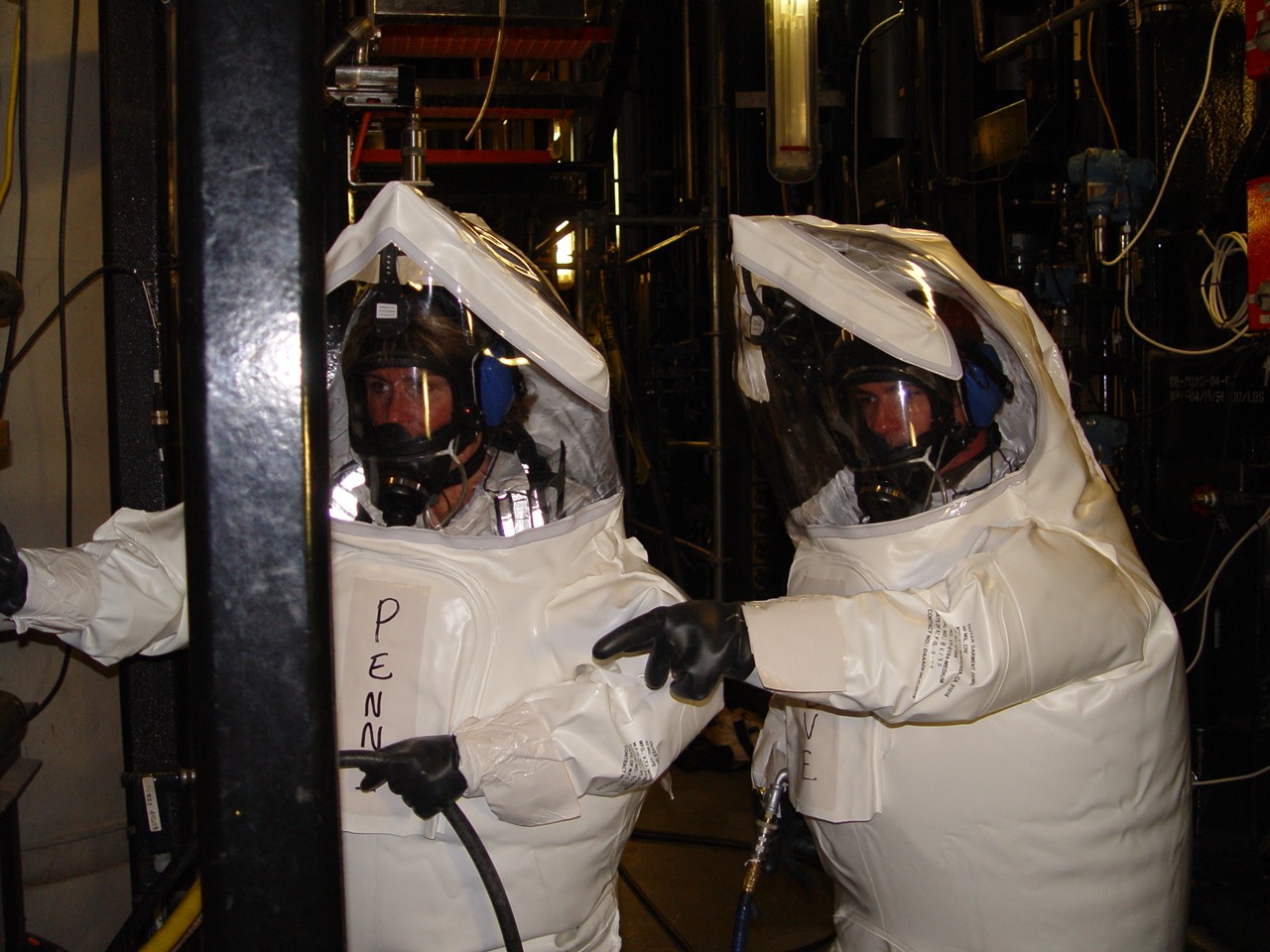 https://upload.wikimedia.org/wikipedia/commons/a/a5/Performing_maintenance_work_in_DPE_suits_at_NECDF.jpg