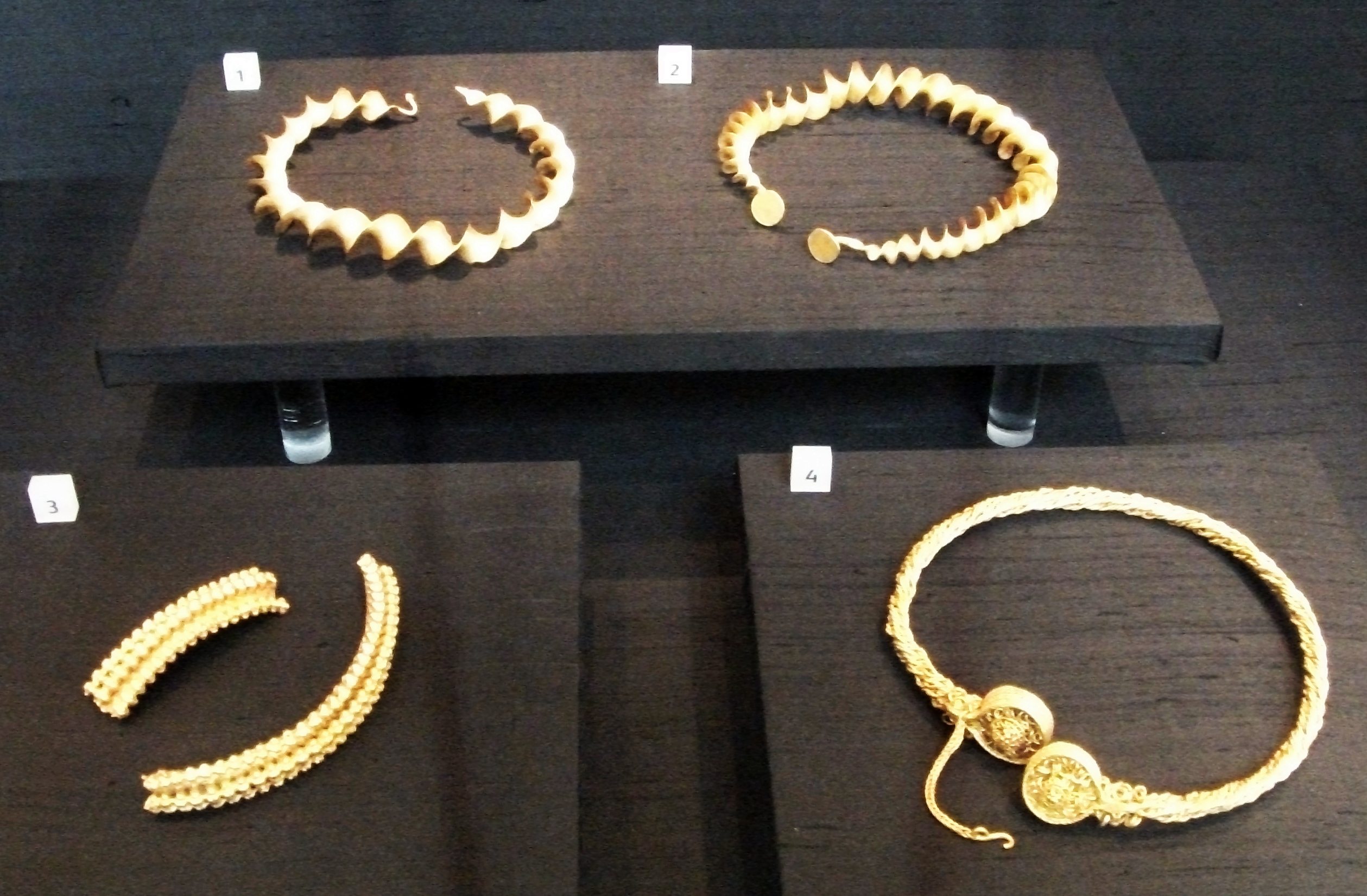 4 gold torcs on display
