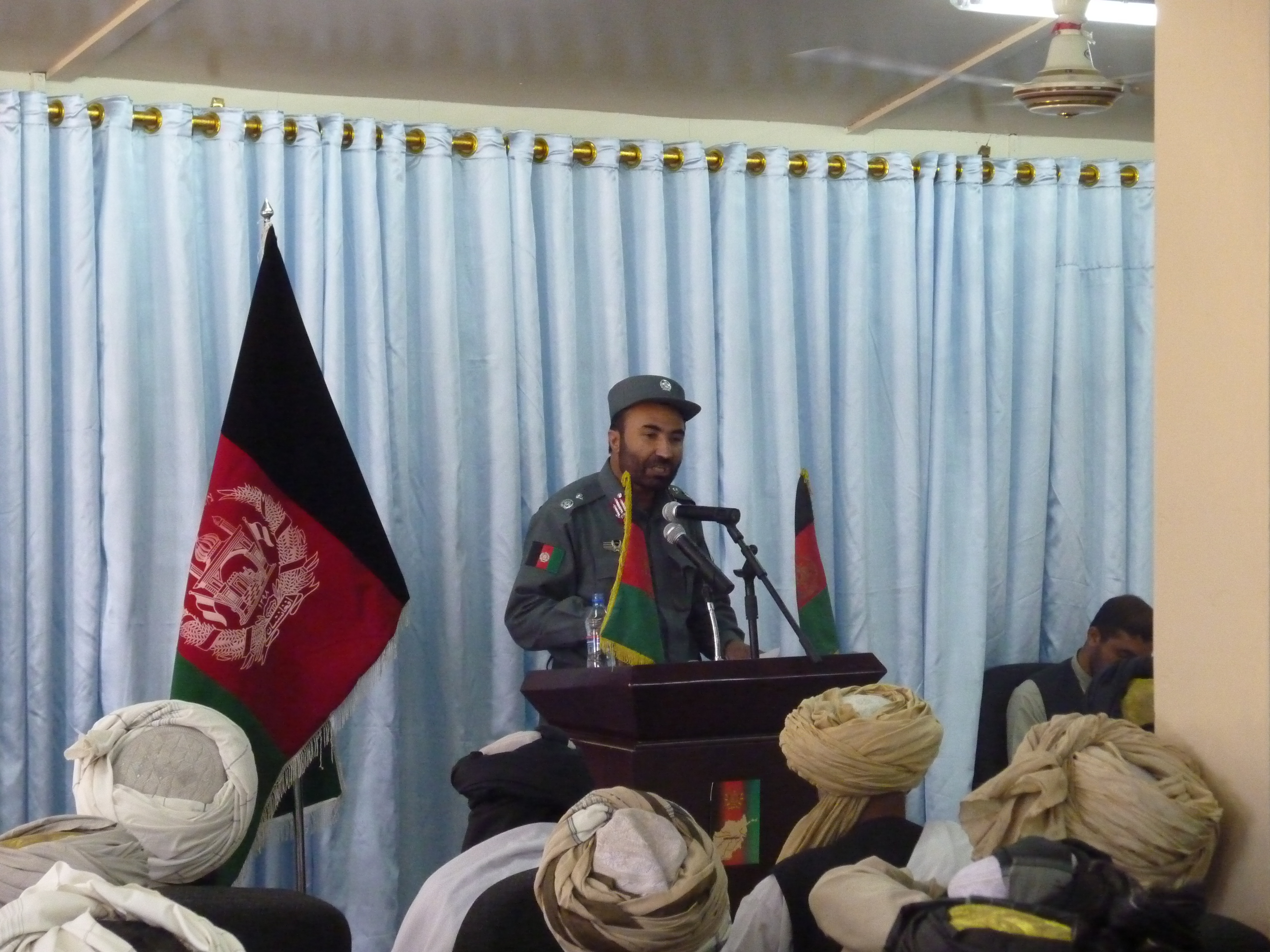 Afghan uniformed police Gen. Dawlat Khan of Paktika province speaks to the assembled mullahs about the need for peace and stability for their country and the Afghan people during a shura on Forward Operating 110608-A-LB208-003.jpg