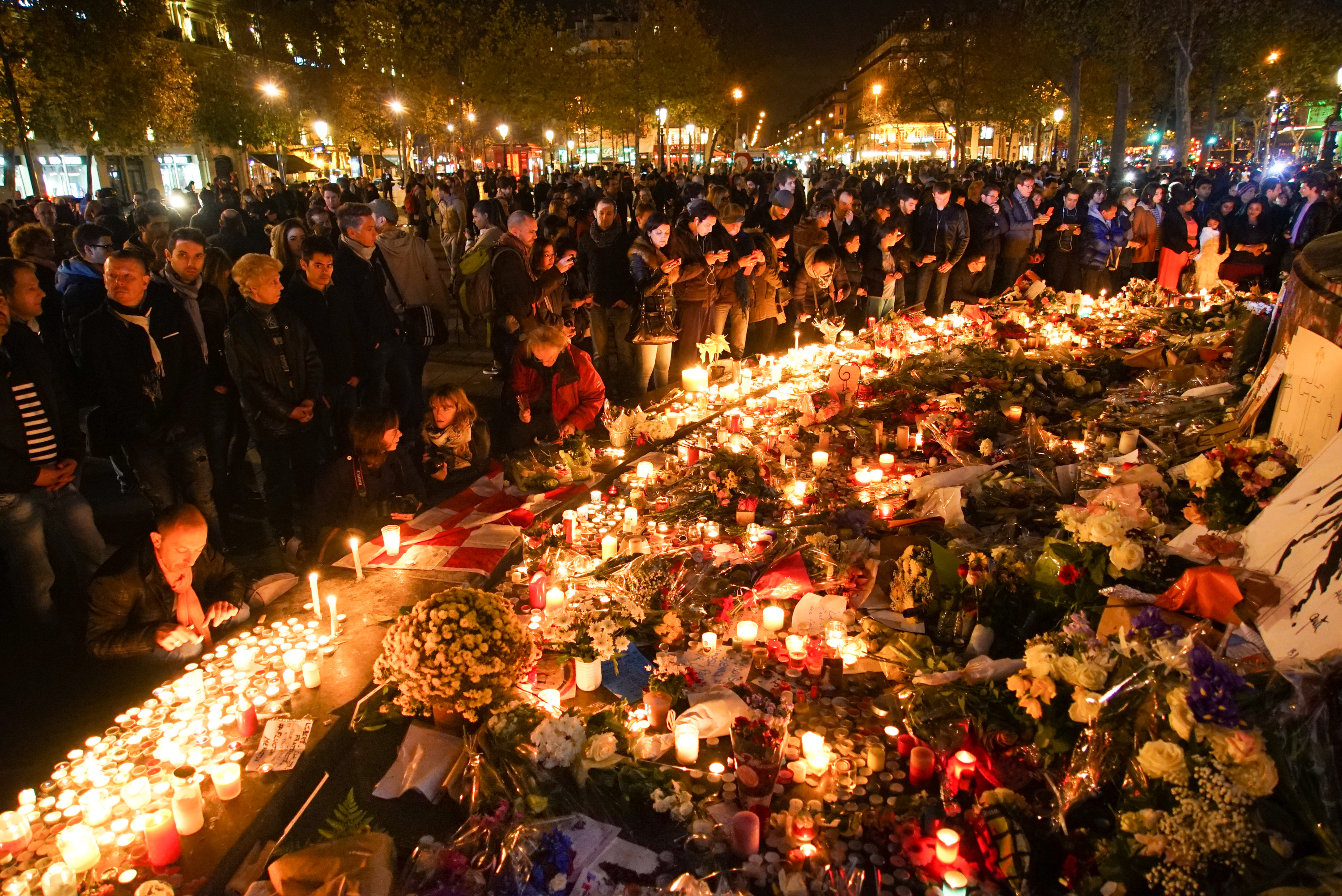 Dozens_of_mourning_people_captured_during_civil_service_in_remembrance_of_November_2015_Paris_attacks_victims._Western_Europe%2C_France%2C_Paris%2C_place_de_la_République%2C_November_15%2C_2015.jpg