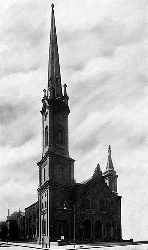 Church with spire shown in black and white.