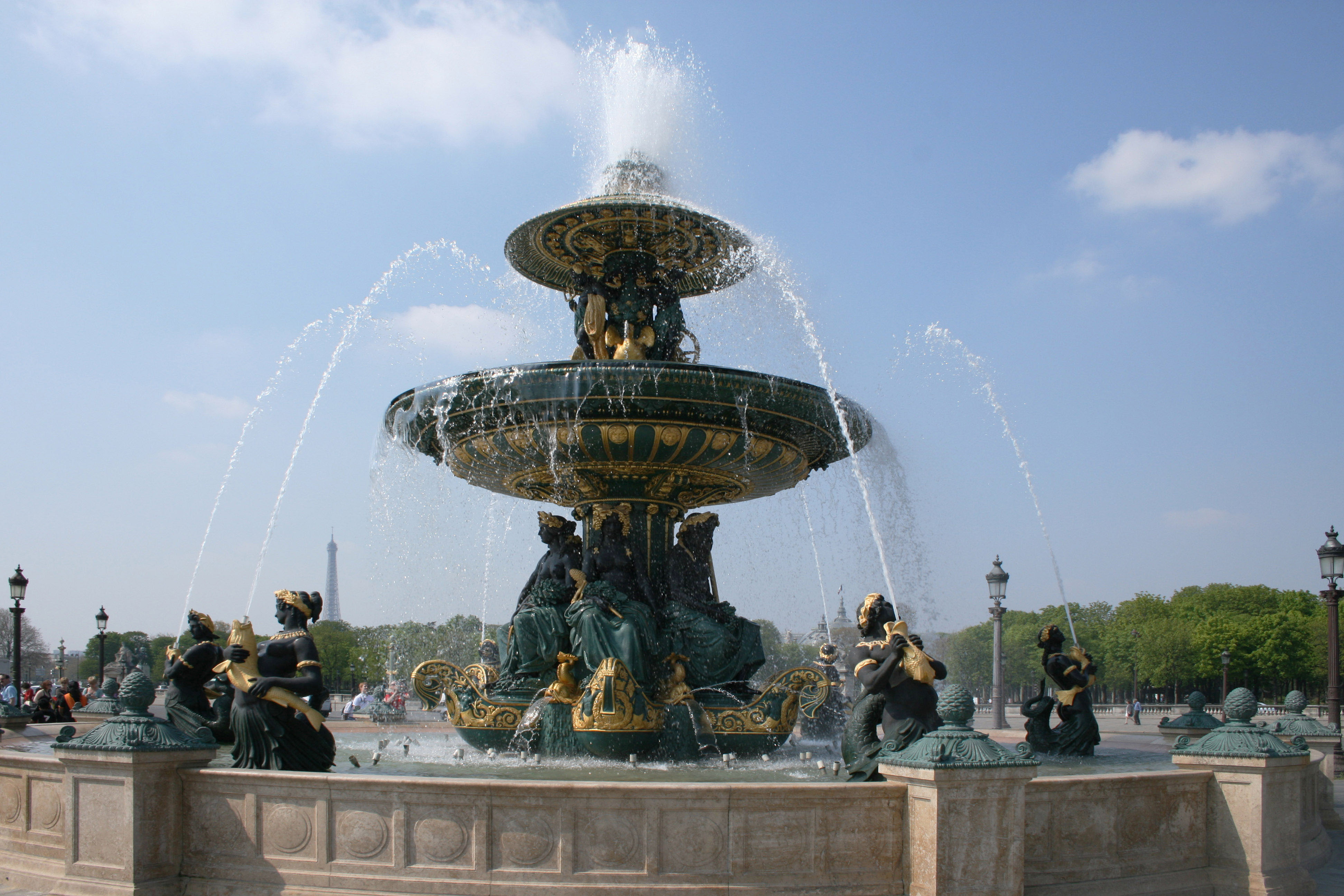 Paris Hotel with mini Eiffel Tower as seen through the fountains