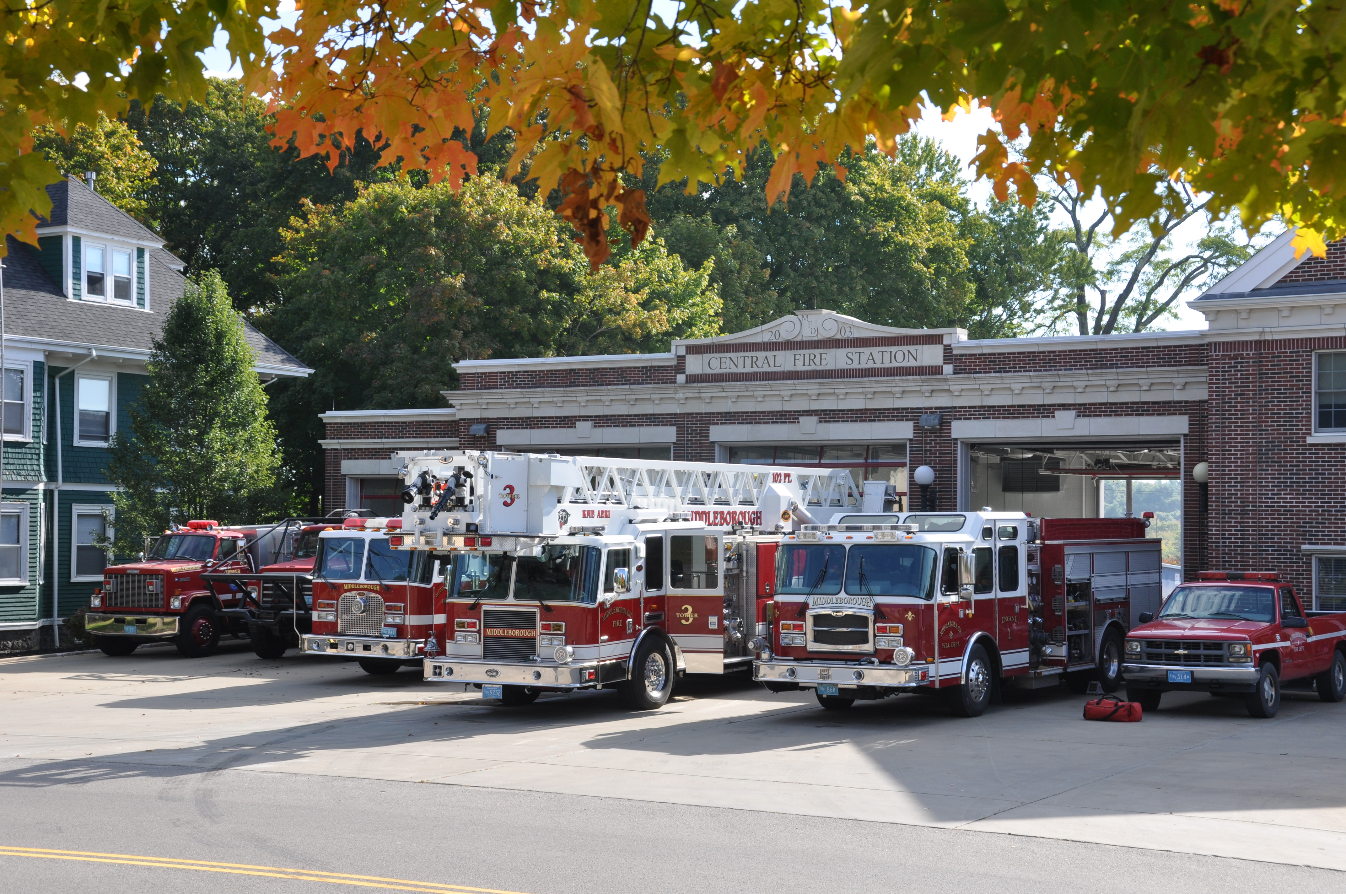 firefighters with fire engine truck during an exercise in fire