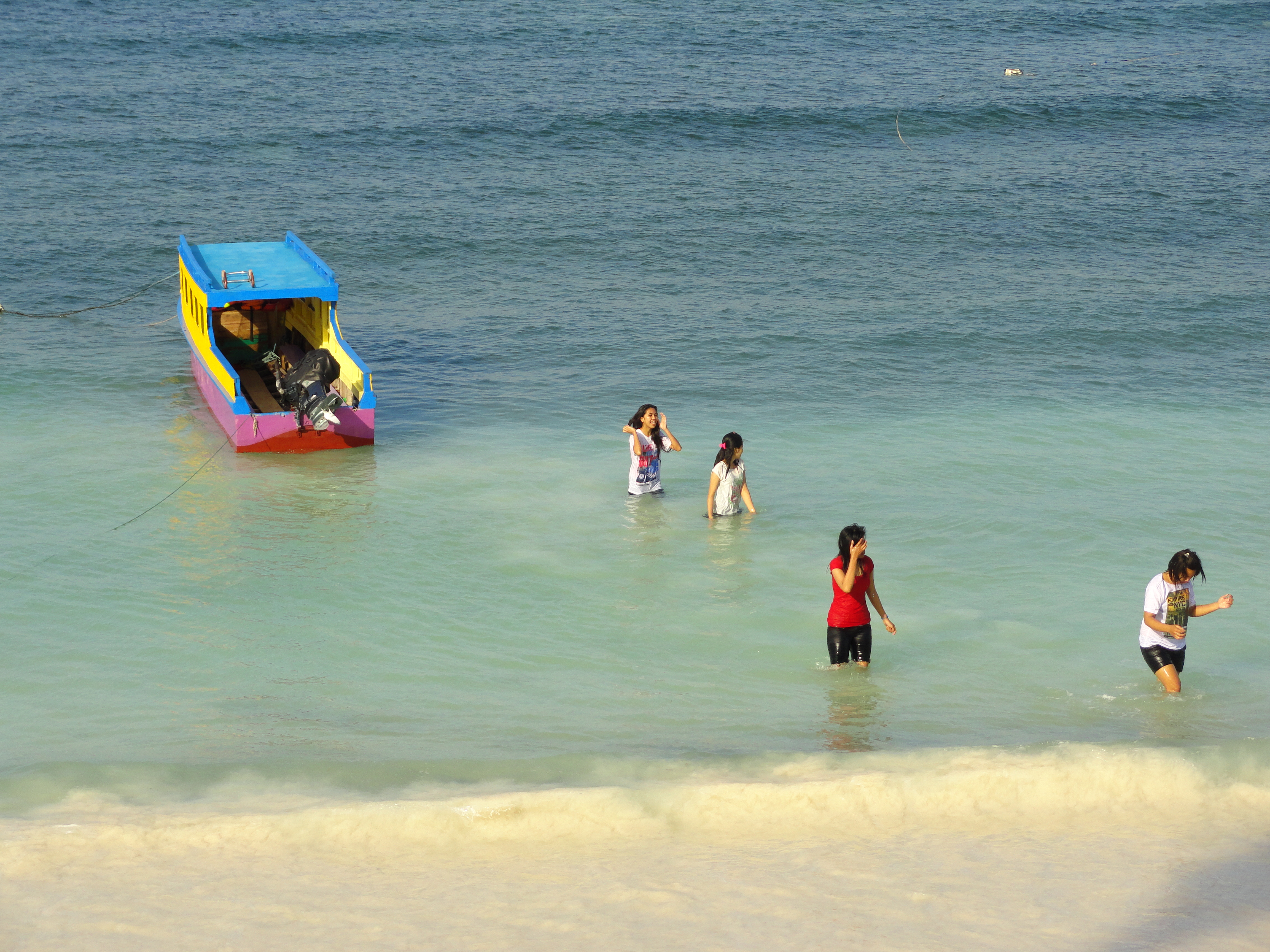 Girls_in_Bira_Beach,_Sulawesi_(15177862092)