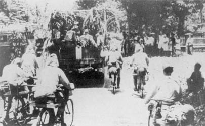 File:Japanese troops move through Java.jpg