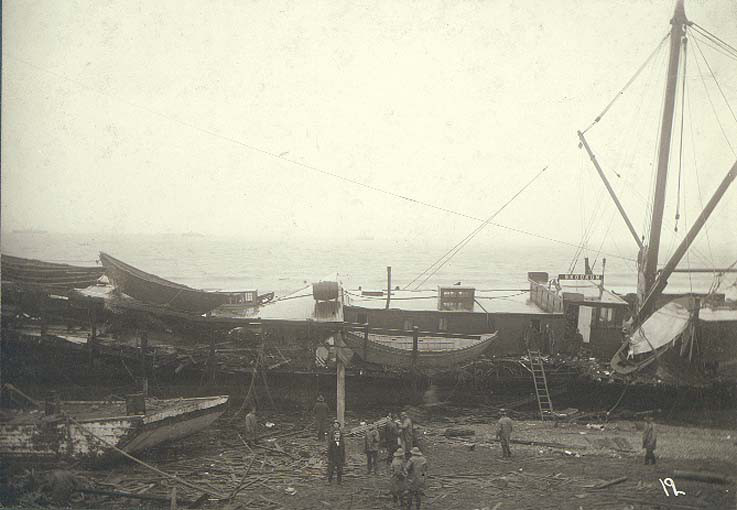 File:Wreck of the steamboat SKOOKUM on the beach, Nome, Alaska, ca 1900 (HESTER 158).jpeg