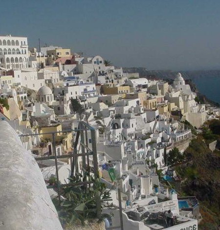 Premium Photo  Open door with mediterranean sea view in santorini