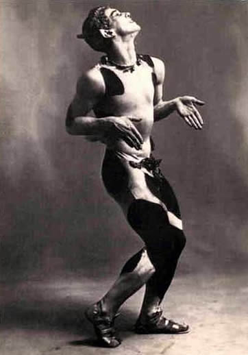 Vaslav Nijinsky, 1912, dancing the Faun. Photograph by Adolf de Meyer.