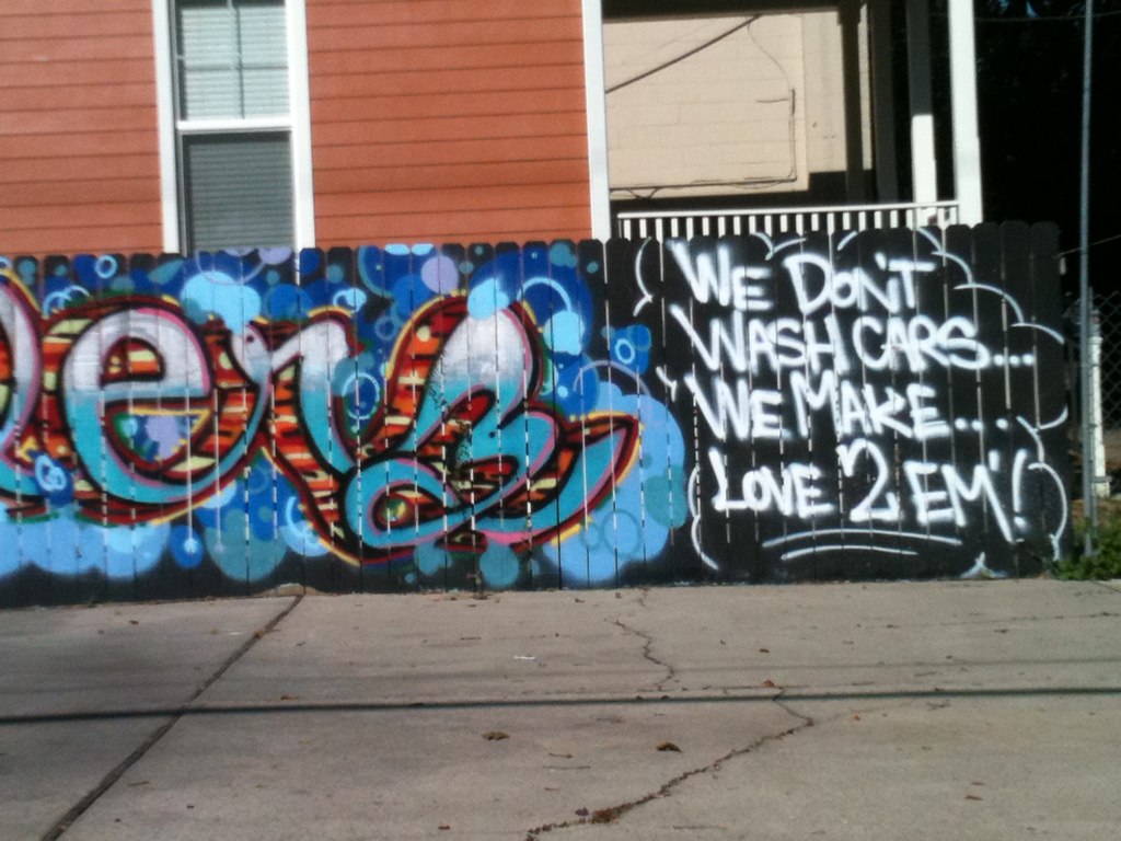 English Dubious car wash sign, New Orleans.