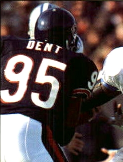 Chicago Bears' Richard Dent carries the Super Bowl Trophy as the 1985 Bears'  championship team is honored duing half time of an NFL football game  between the Chicago Bears and the Washington