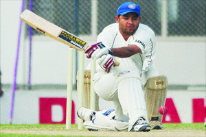 Piyush Chawla playing a reverse sweep during a Ranji Trophy match at the stadium Piyush chawla in action.jpg