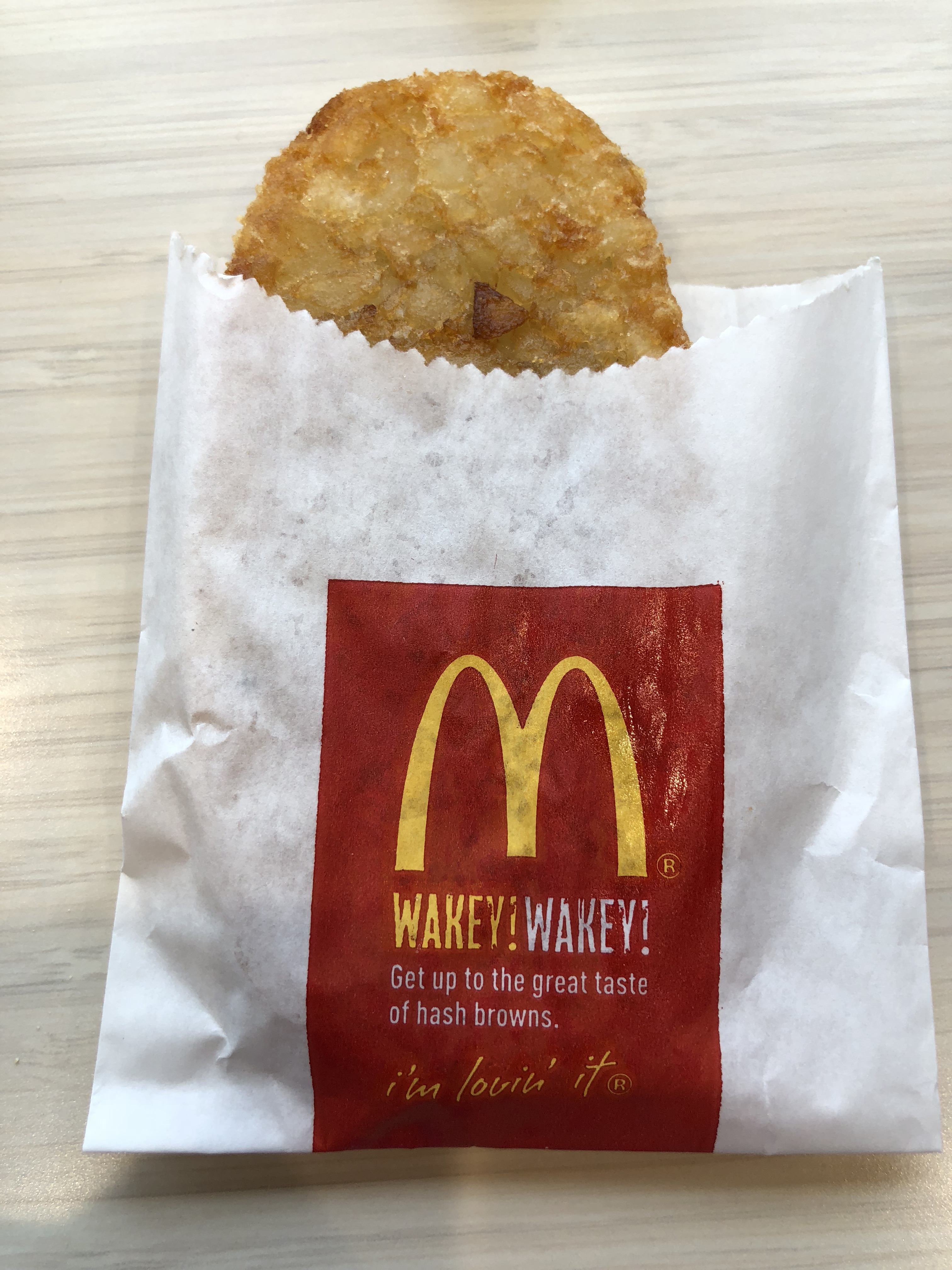 https://upload.wikimedia.org/wikipedia/commons/a/ac/2019-01-29_13_19_45_A_McDonald%27s_hash_brown_still_in_its_wrapper_in_Chantilly%2C_Fairfax_County%2C_Virginia.jpg