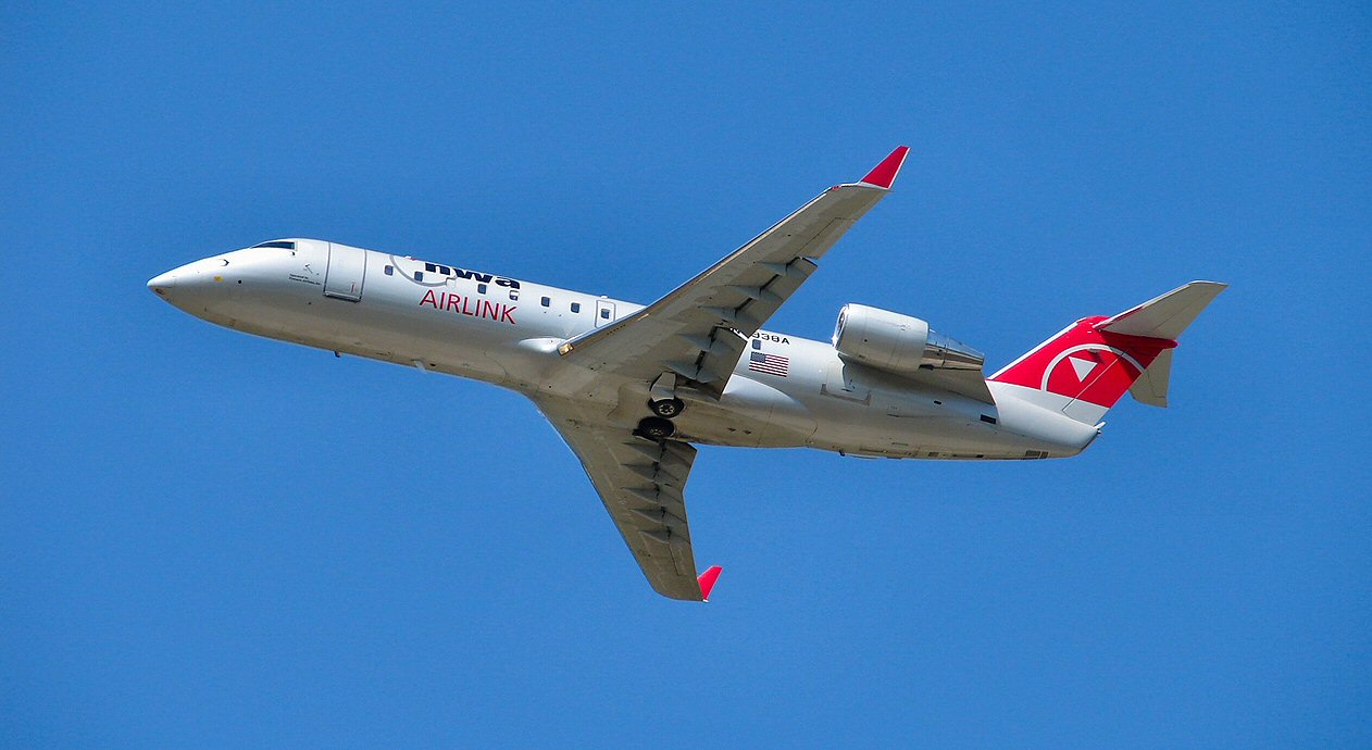 CRJ Leaving LSE (293092345).jpg