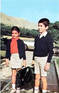 Crown Prince Reza Pahlavi and Princess Farahnaz at the first day of school, 1970.jpg