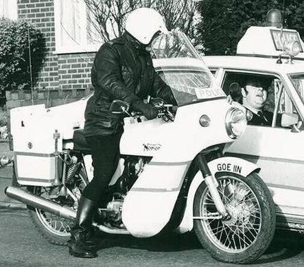 File:Day 147 - West Midlands Police - Archived photograph of police bike & car CROP (cropped).jpg