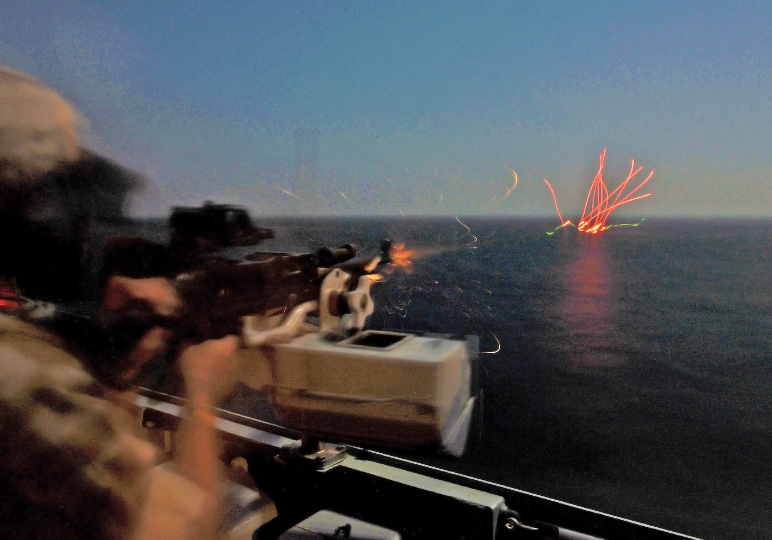 machine gun firing night