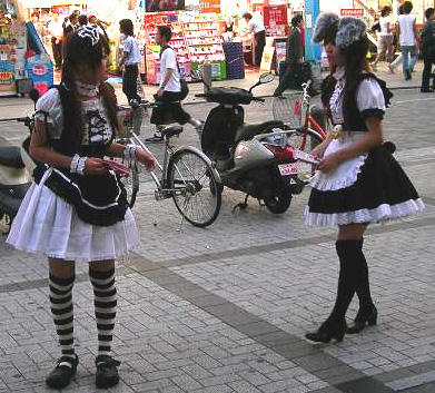 Maids promoting cafes in Akihabara, Tokyo