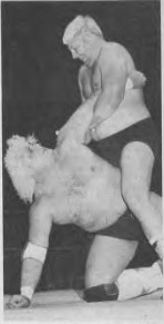 Murdoch in a match against Dusty Rhodes, c. 1982