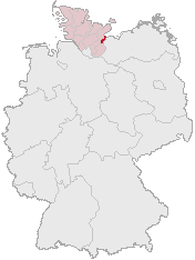 Lübecks (mörkrött) läge i Tyskland och delstaten Schleswig-Holstein (ljusrött).