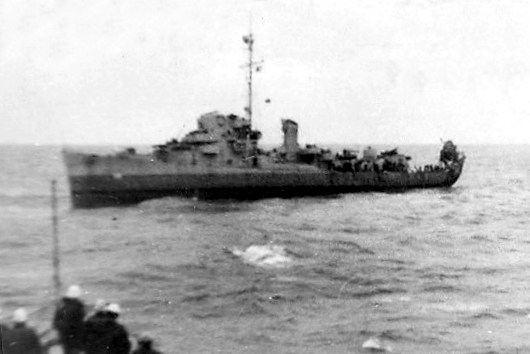 File:Damaged USS Donnell (DE-56) being taken in tow on 4 May 1944.jpg