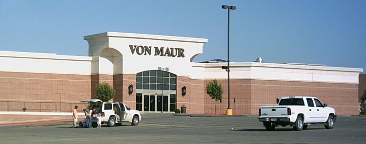 A logo sign outside of a Von Maur, Inc., retail store in Omaha