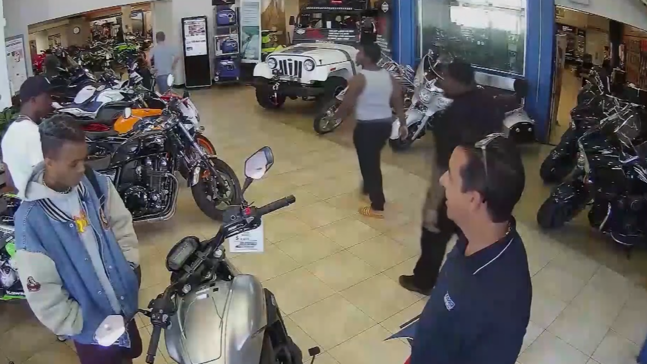 File:XXXTentacion followed into motorcycle dealership.png