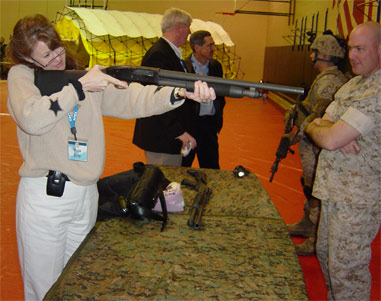 File:Dr Myra S. Gray tries out a combat Shotgun.jpg