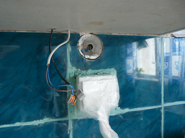 File:Kitchen air extractor after tiles put to wall.JPG