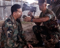 File:Navy Lt. Abuhena M Saiful prays with Guantanamo captives.jpg