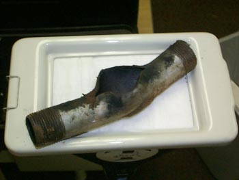 File:Pipe bomb - black powder.jpg