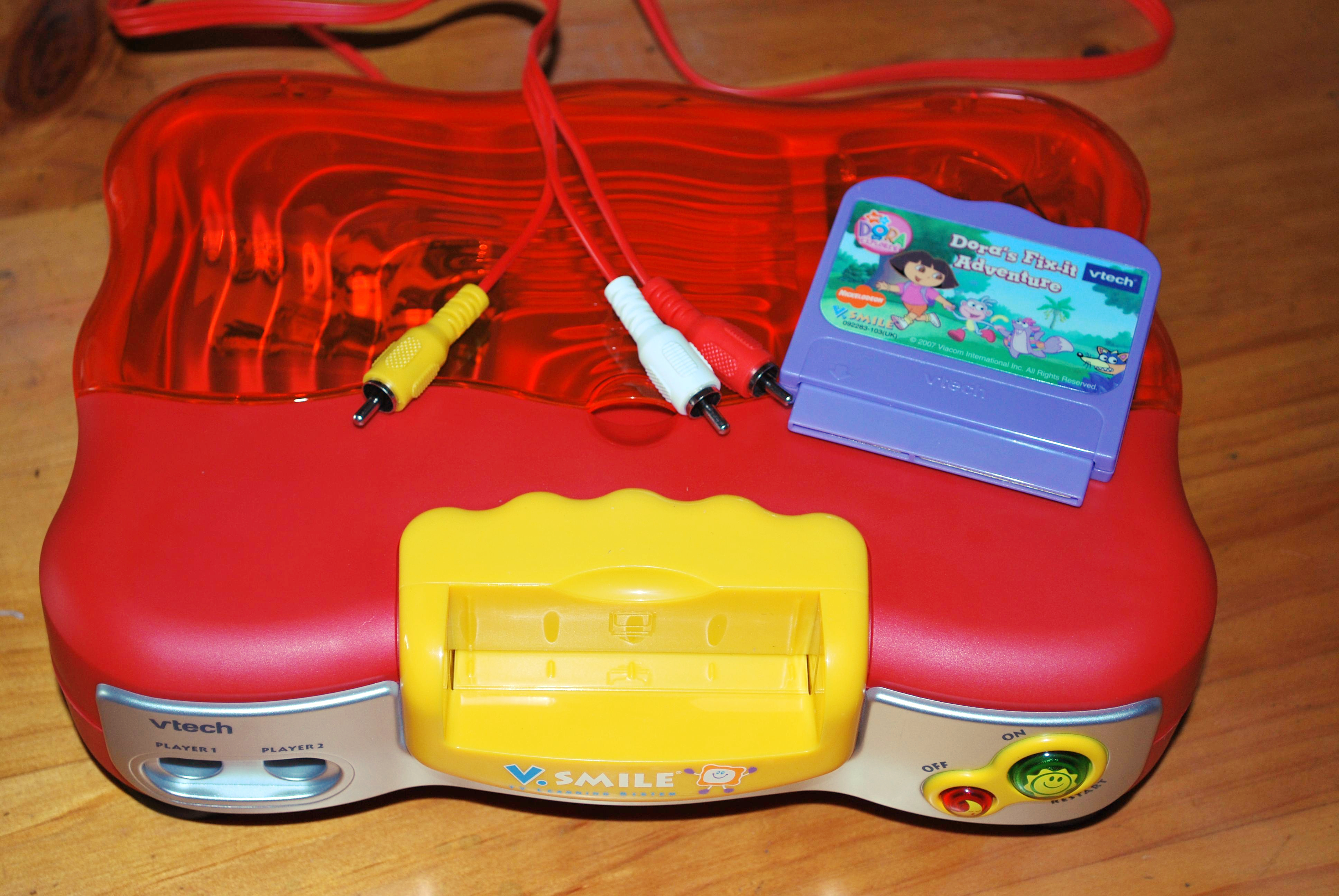 Console V smile baby vtech + 2 jeux neuf - VTech