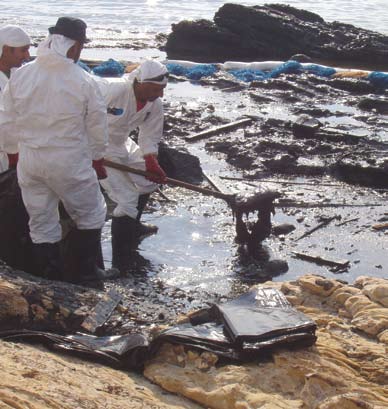 File:Jiyeh Power Station oil spill cleanup, USAID 2006.jpg