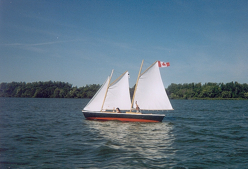 Close-hauled: the flag is streaming backwards, the sails are sheeted in tightly.