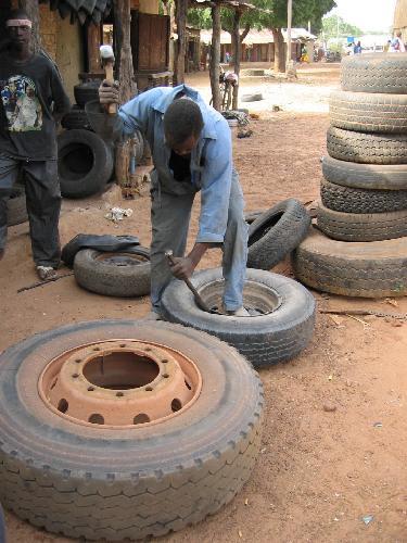 File:1917282-Soma the repairing of the tyre-The Gambia.jpg