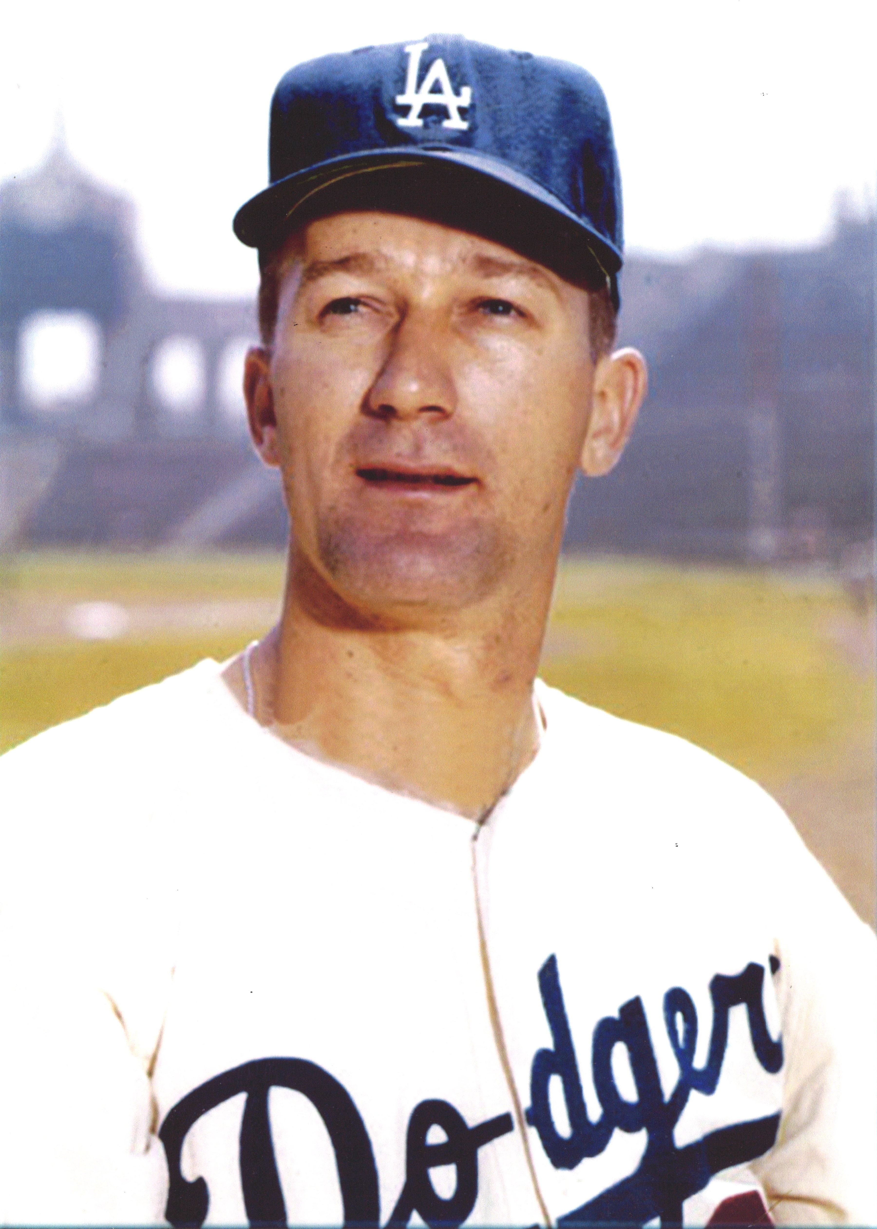 Former Major Leaguer Ozzie Virgil leaves the field after throwing