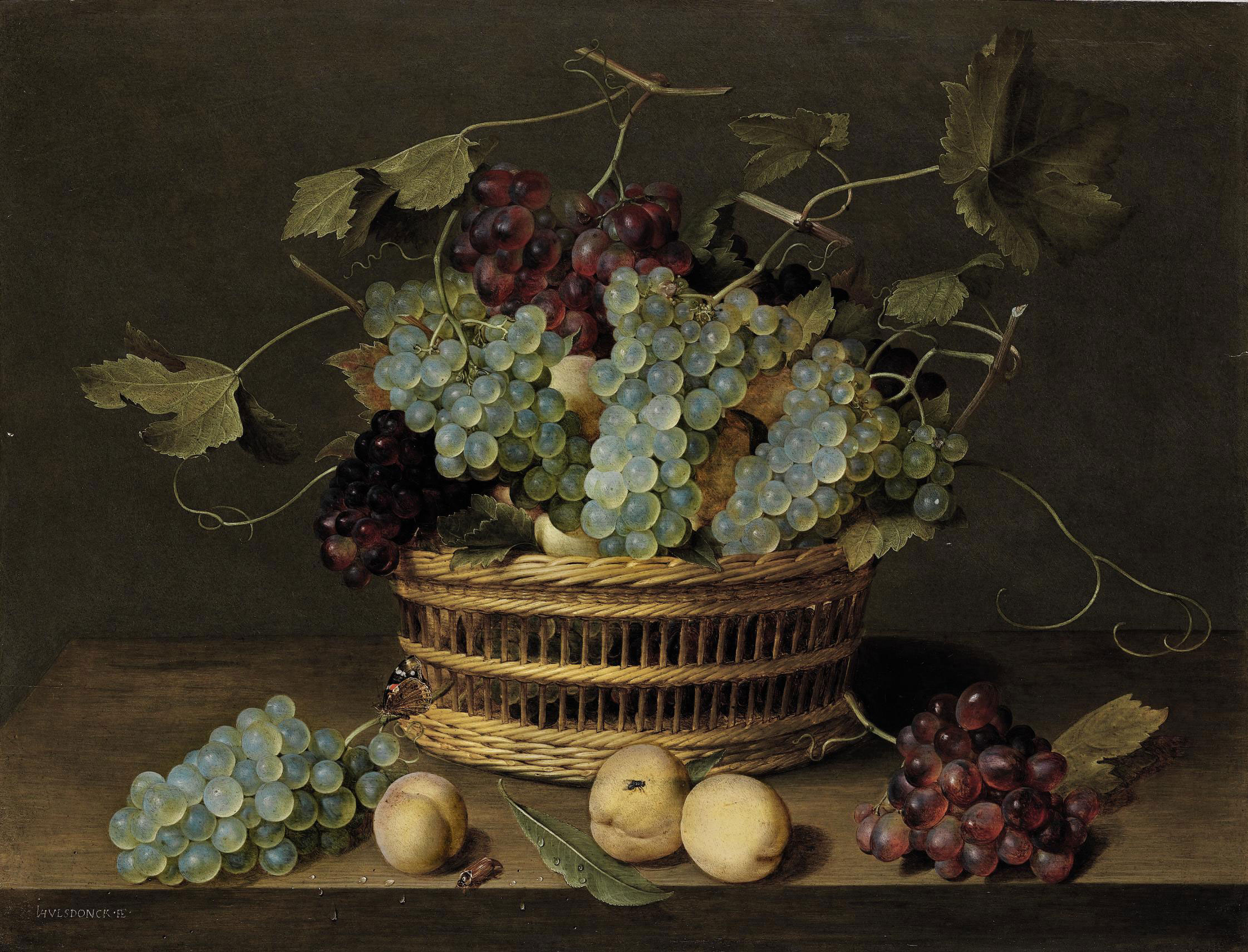 A Still Life Of Grapes In A Basket And A Bunch In A Wan-li 'Kraak'  Porcelain Bowl With Figs In A Tazza On A Red Draped Ledge With A Woodstock,  Pheasants, A