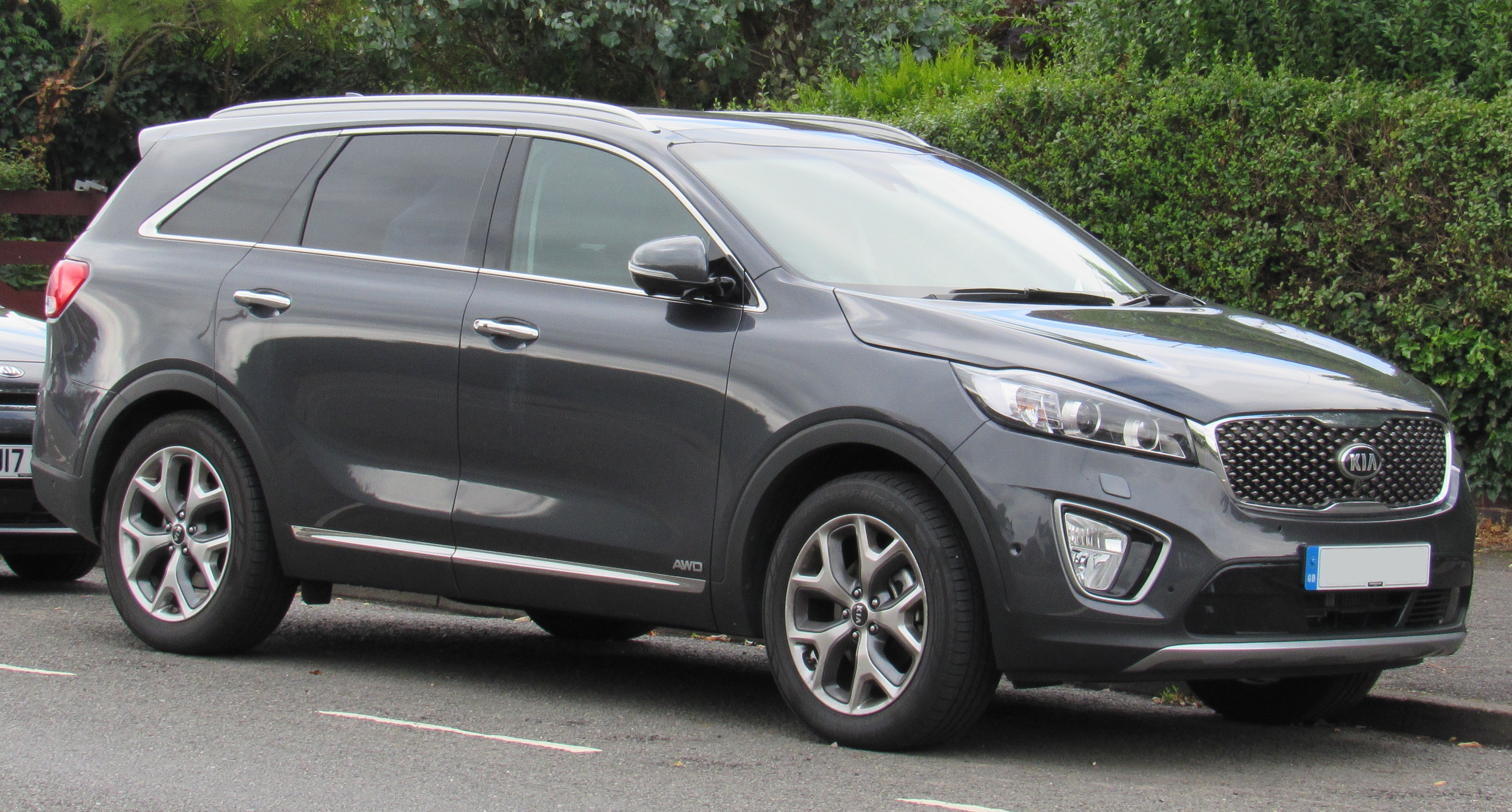 Grey Kia Sorento on a street