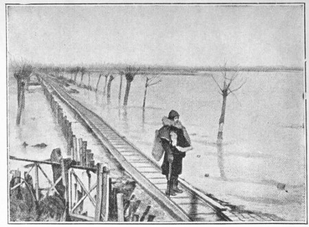 File:A footbridge through the floods replaces a road and carries a narrow-gauge railway.jpg