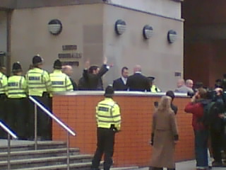Nick Griffin and Mark Collett leave Leeds Crown Court on 10 November 2006 after being found not guilty of charges of incitement to racial hatred at their retrial.