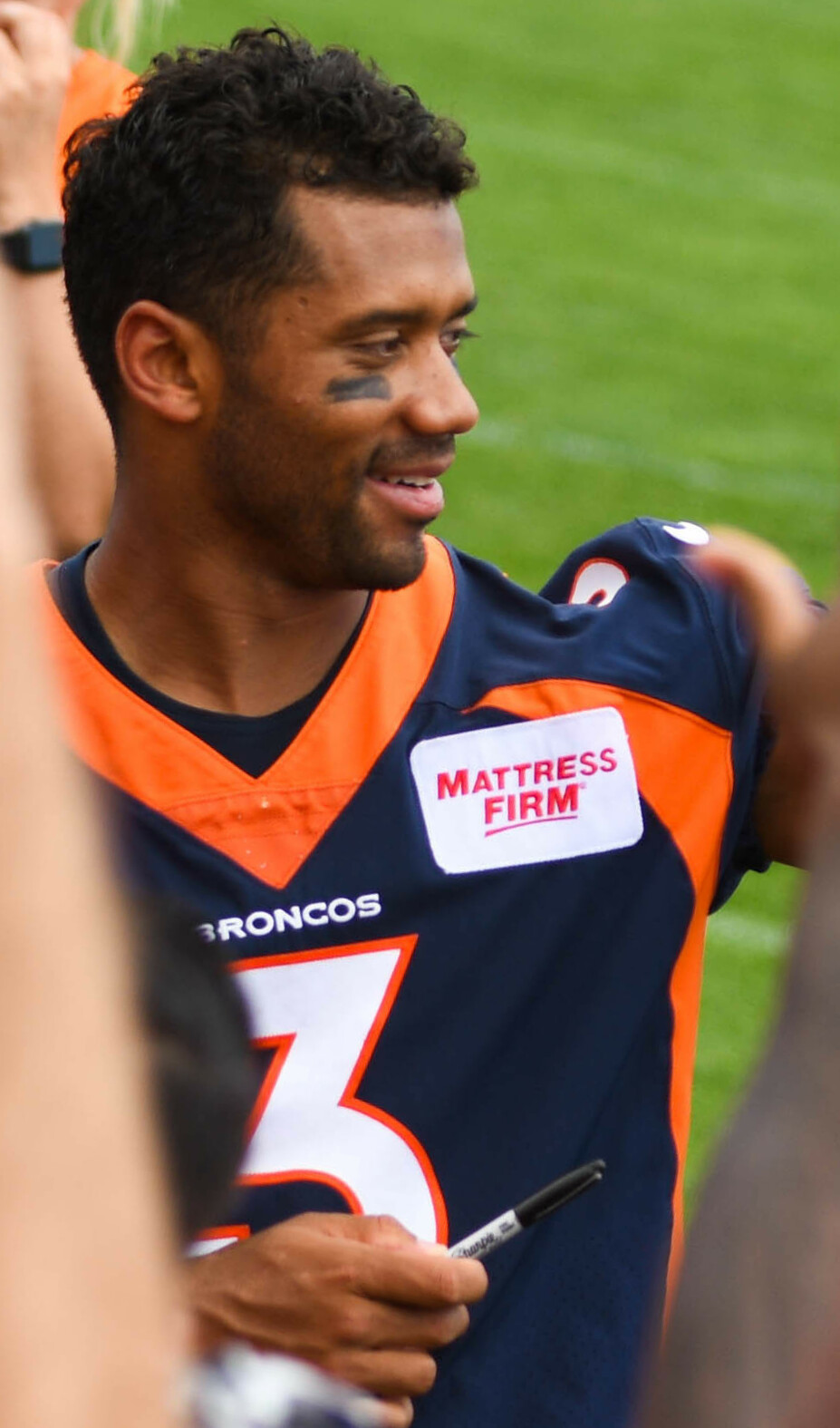 russell wilson in a broncos uniform