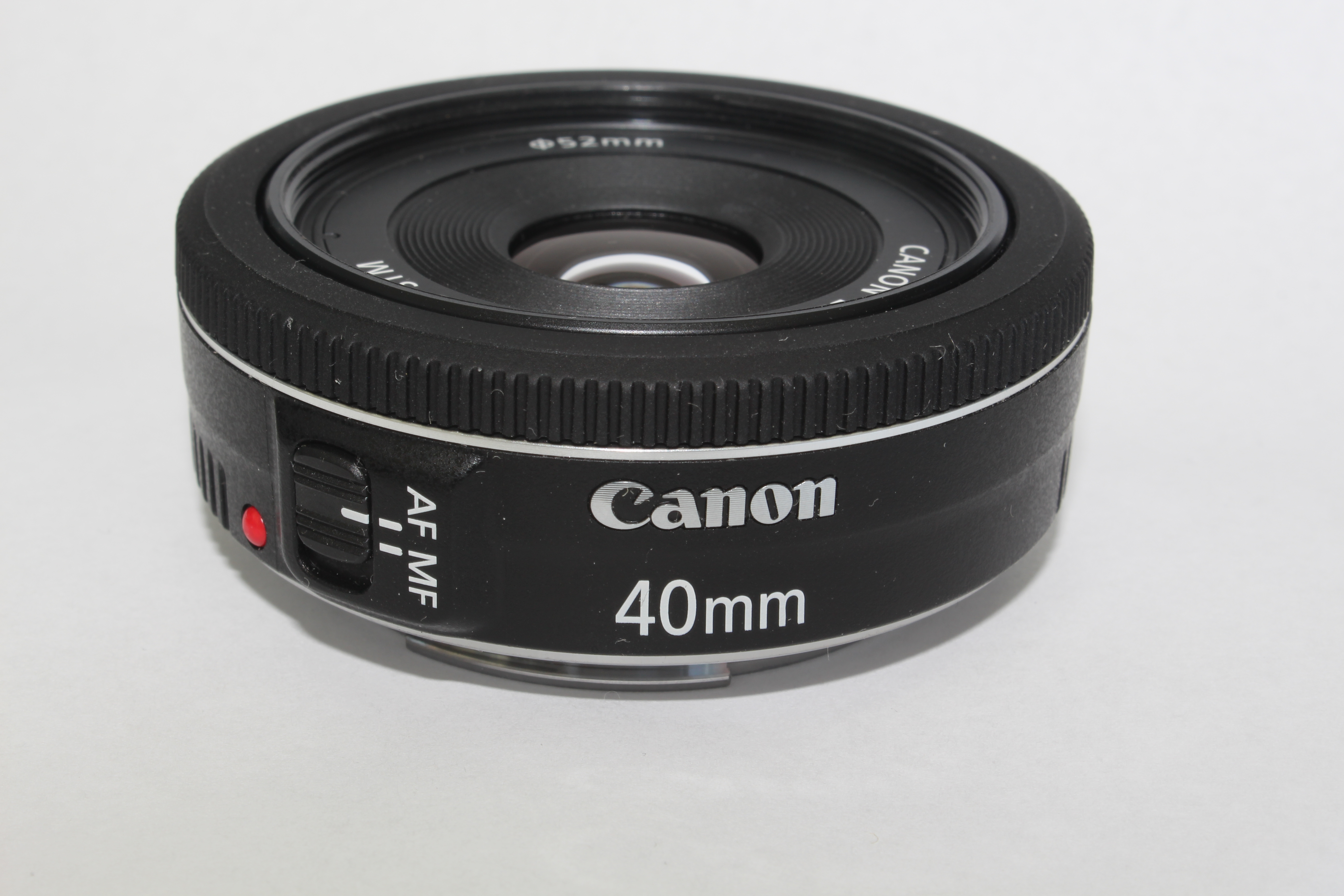 Объективы 40mm. Canon ef40 f2.8 STM. Canon 40mm 2.8 STM. Canon EF 40mm f/2.8 STM. Canon EF 40 STM.